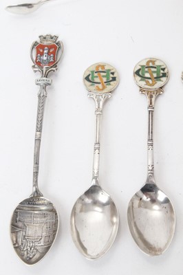 Lot 224 - 16 silver spoons and sugar tongs and three silver brushes