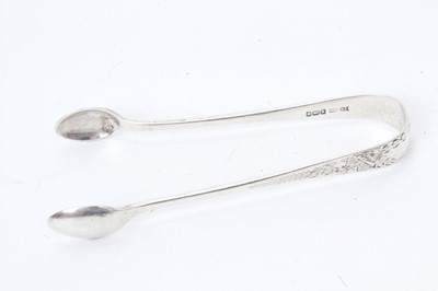 Lot 224 - 16 silver spoons and sugar tongs and three silver brushes