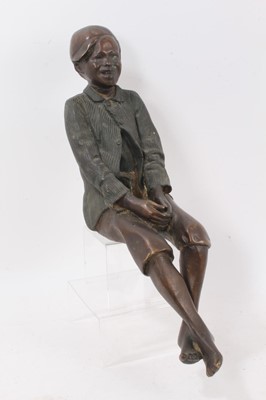 Lot 643 - Bronze of a seated boy