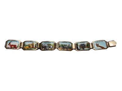 Lot 1034 - South African enamelled white metal bracelet