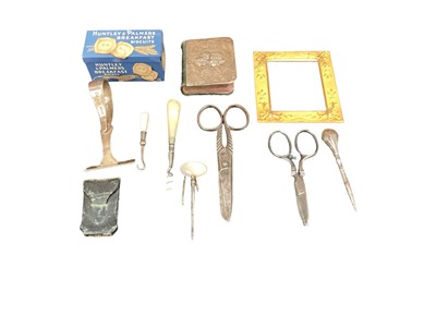 Lot 112 - Silver mounted miniature book, miniature Huntley & Palmers tin and other small items including sewing accessories