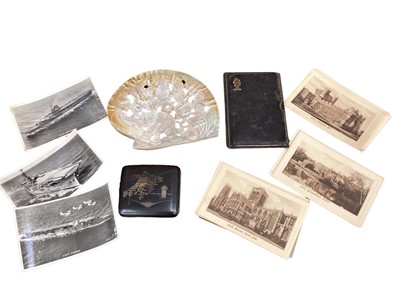 Lot 114 - Carved mother of pearl shell with elephant decoration, cigarette case, travel chess set and postcards