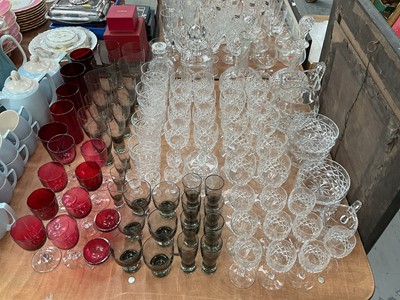 Lot 409 - Collection of cut glass table wares to include decanters and other glassware to include cranberry glass