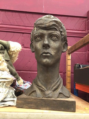 Lot 653 - Cold cast bronze (resin) bust of a boy on a wooden base, with label to base, 45cm high