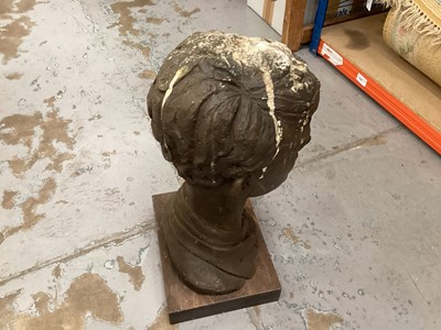 Lot 653 - Cold cast bronze (resin) bust of a boy on a wooden base, with label to base, 45cm high