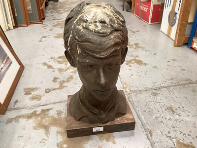 Lot 653 - Cold cast bronze (resin) bust of a boy on a wooden base, with label to base, 45cm high