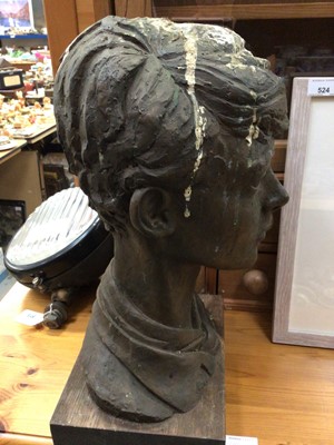 Lot 653 - Cold cast bronze (resin) bust of a boy on a wooden base, with label to base, 45cm high