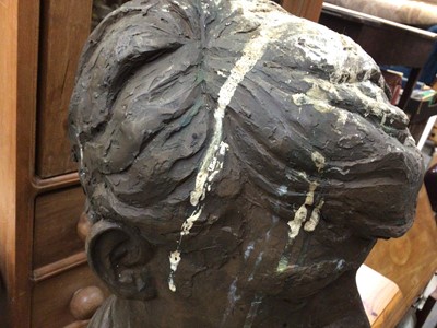 Lot 653 - Cold cast bronze (resin) bust of a boy on a wooden base, with label to base, 45cm high