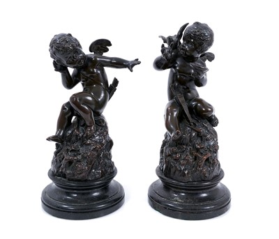 Lot 626 - Pair of 19th century French bronze figures of putti, on marble bases