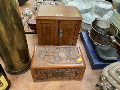 Lot 433 - Edwardian oak desk top stationary cabinet together with an oriental carved box (2)