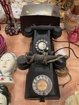 Lot 440 - Two vintage Bakelite telephones one with an Earls Colne card, together with a vintage radio (3)