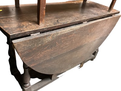 Lot 1272 - Eighteenth century oak drop leaf table with end drawer, 121cm wide