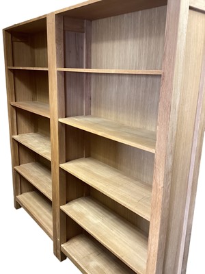 Lot 1284 - Pair of modern light oak bookcases, 100cm wide, 30cm deep, 190cm high