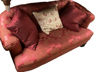 Lot 1289 - Victorian sofa with buttoned red upholstery on turned front legs, 130cm wide approximately