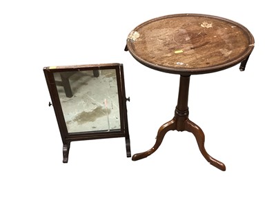 Lot 1298 - Mahogany tripod wine table, mahogany standard lamp and a swing mirror (3)