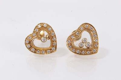 Lot 395 - Pair of gold and diamond set heart earrings with glazed compartments containing loose diamonds