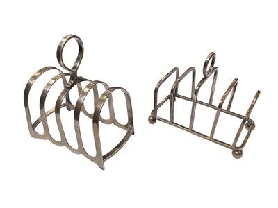 Lot 1103 - Two silver toast racks