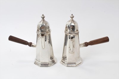 Lot 154 - Pair Edwardian silver café au lait pots of octagonal form, with hinged domed covers