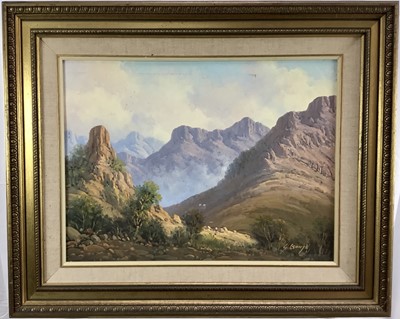 Lot 167 - 20th century oil on canvas, mountainous landscape with mist rising. Probably a view of Kruger National Park, South Africa. Signed lower right. Framed. Overall including frame 68.5x83cm