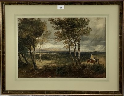 Lot 157 - Manner or circle of David Cox, British 1783-1859. Watercolour study of an extensive landscape with figure on horseback and trees in foreground. Mounted and framed. Overall including frame 55x70cm