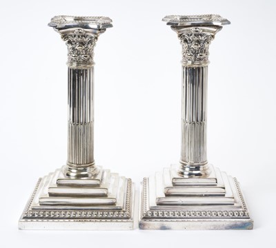 Lot 156 - Pair Victorian silver plated Corinthian column candlesticks of conventional form