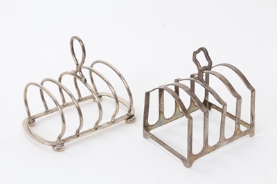 Lot 158 - Late Victorian silver four division wire toast rack, on four bun feet (London 1898) Hukin & Heath