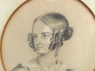 Lot 94 - Early Victorian portrait study of a young lady, graphite heightened in white chalk. Signed and dated 1840 lower right. In gilt frame with oval mount. Overall including frame 40.5x35cm