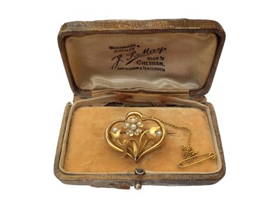 Lot 1106 - Edwardian 15ct gold and seed pearl floral brooch in box