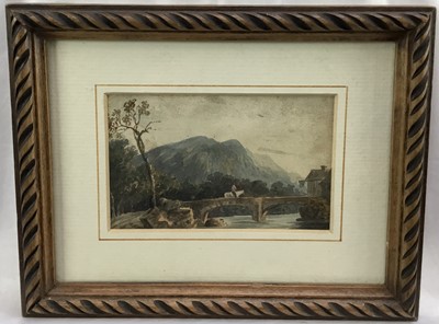 Lot 99 - 18th or early 19th century British School. Watercolour, figure on horseback crossing a bridge over a river, mountains in the distance. Mounted and framed. Overall including frame 16x20.5cm