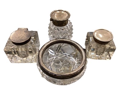 Lot 1112 - Three silver mounted glass inkwells and a silver mounted glass bowl (4)