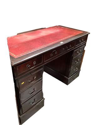 Lot 1362 - Georgian style twin pedestal desk with inset leather lined top and eight drawers below, 124cm wide, 61cm deep, 77cm high