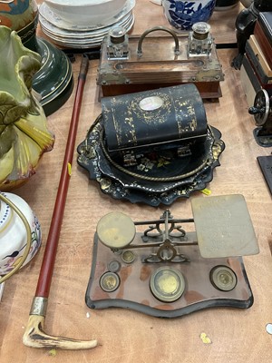 Lot 461 - Late Victorian oak ink stand, together with Victorian papier-mâché items, riding crop and letter scales.