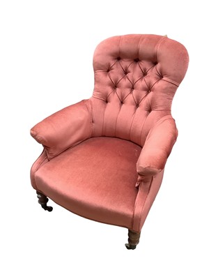 Lot 1378 - Victorian armchair with buttoned pink upholstery on turned front legs