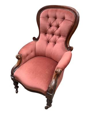 Lot 1379 - Victorian mahogany framed spoon back armchair with buttoned pink upholstery on turned front legs