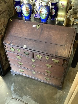 Lot 1389 - Georgian oak bureau with fitted interior, two short and three long drawers below, 92cm wide, 53cm deep, 96.5cm high