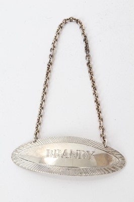 Lot 167 - Contemporary silver decanter label of elliptical form, marked BRANDY