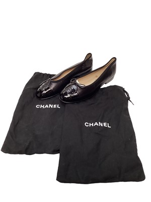 Lot 2083 - Chanel shoes in black leather with bow detail and CC logo on patent toe cap with soft dust bags.  Size 36.  Unworn