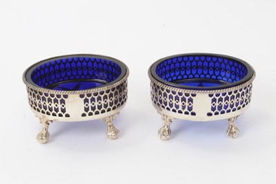 Lot 169 - Pair George III silver salts of oval form with diaperwork decoration and ropework borders