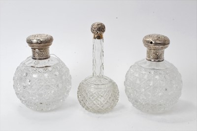 Lot 172 - Pair large Victorian hobnail cut glass globe perfume bottles, with silver mounts