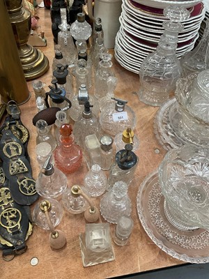 Lot 501 - Collection of cut glass and other scent bottles, including some silver mounted examples.