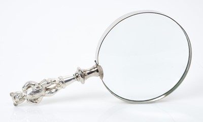 Lot 174 - Magnifying glass with late Edwardian silver handle, in the form of a double sided bear