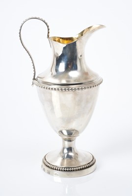 Lot 175 - Early 19th century Dutch silver cream jug in the form of a ewer with beaded borders