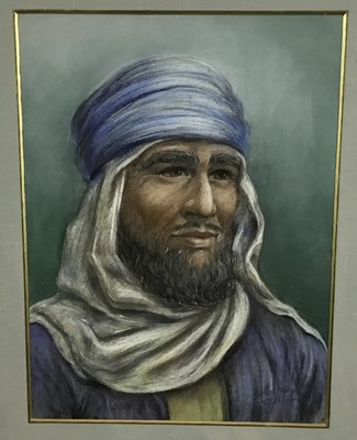 Lot 319 - Coral Polge, 1960s pastel - portrait of an Arab gentleman, signed and dated 1963, 40cm x 29cm, in glazed gilt frame