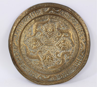 Lot 619 - Chinese embossed brass dish