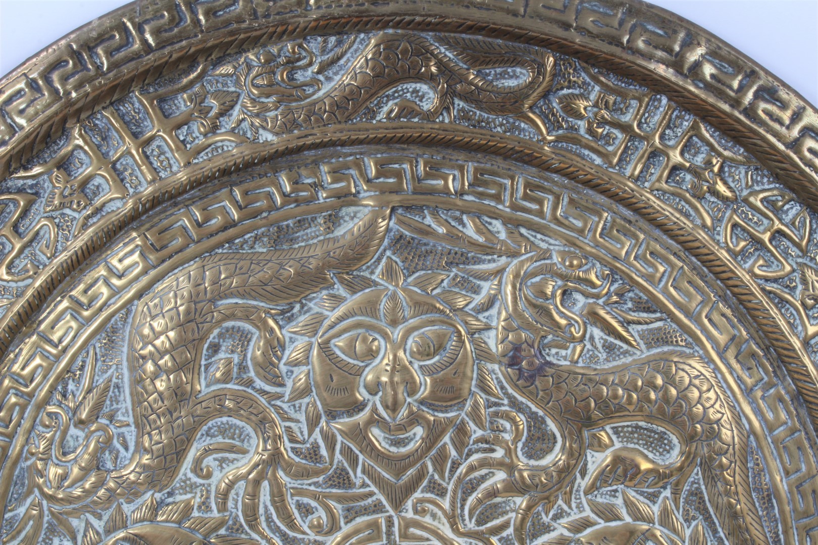 Lot 619 Chinese embossed brass dish