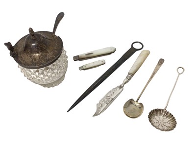 Lot 295 - Georgian silver meat skewer, Victorian silver butter knife, Georgian cut glass jar (marked to rim). Two Mother of Pearl and silver folding fruit knives, silver sifting spoon and silver spoon with u...