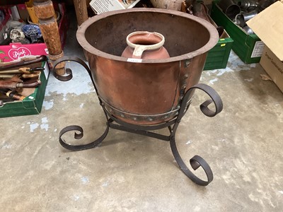 Lot 1414 - Riveted copper vessel on iron stand