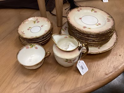 Lot 717 - Part teaset with gilt border and strawberry decoration - 23 pieces