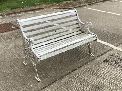 Lot 1382 - White painted Cast iron garden bench