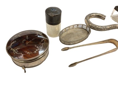 Lot 1123 - Group of silver, including a Victorian purse mount, tongs, tortoiseshell box, etc, and an Indian white metal cane handle